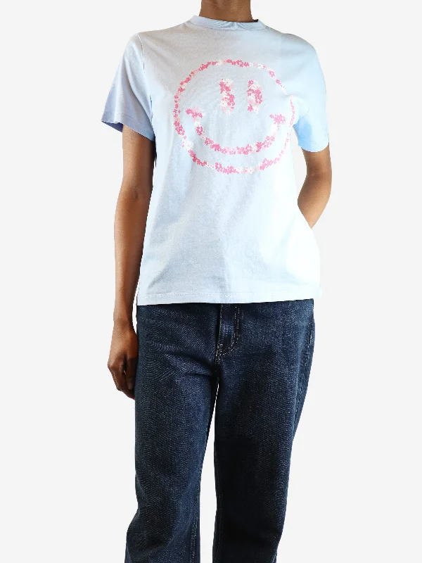 Light blue floral smiley face t-shirt - size XS